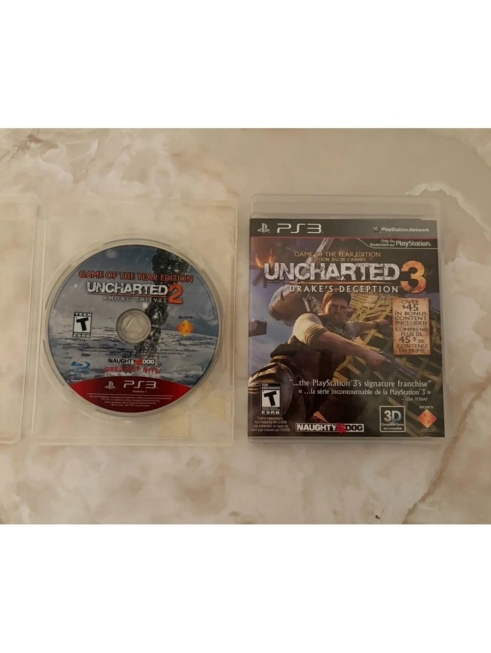 Uncharted 2 & 3 PS3 Game Lot GOTY Drake's Deception CIB Among Thieves Disc Only